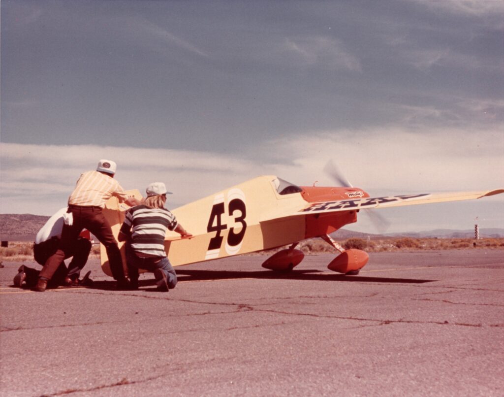 In 1973 I was invited along to hang out and crew at the Reno Air Races. Mira Slovak, who had won the very first Reno Air Race in 1964 was there in his P-39 Air Cobra. In this photo I'm helping hold back a Cassutt race plane owned and piloted by Ken Haas. Those were the days of Bob Hoover, huge crowds, exciting races and non-stop airshows.